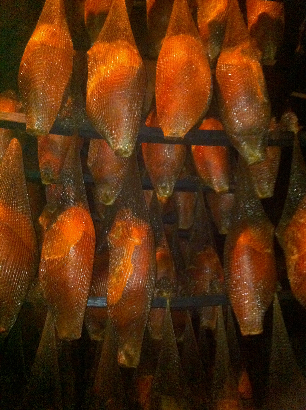Father's Country Hams Aging in our Smoke House